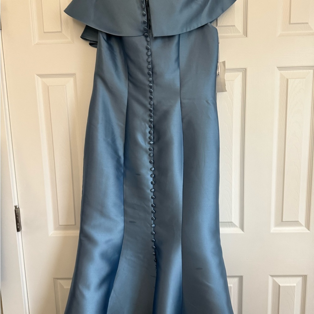 Sophisticated Satin Off-Shoulder Gown
Cameron Blake Evening Gown - Picture 4 of 5